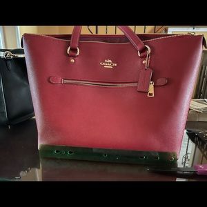 Red coach handbag in great shape zip outside pocket and inside pockets